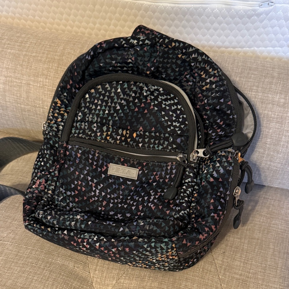 Mini back pack style sling bag